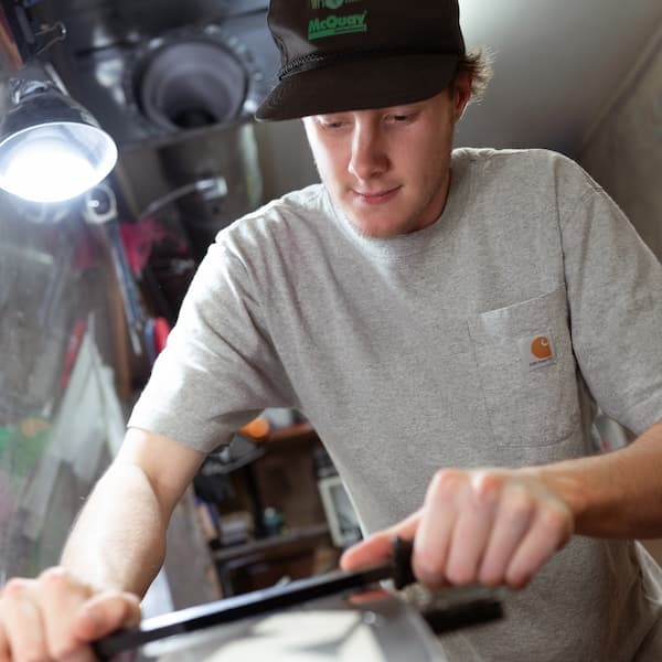 A craftsman maintaining skis | Totally Boise Business Directory